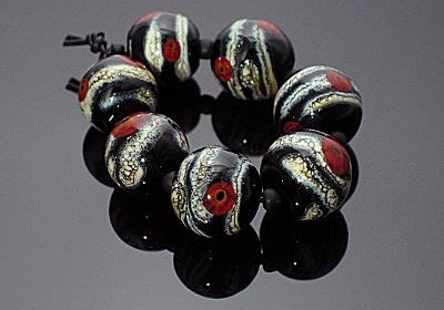 Lampwork Poppies on a black base Lampwork Poppies on a black base