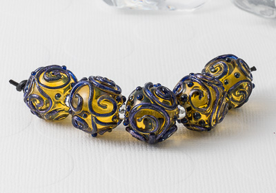Amber Scrollwork Lampwork Beads