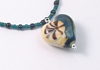 Blue Silvered Lampwork Heart Pendant Necklace In Detail